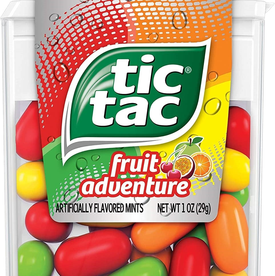 A package of Tic Tac mints with the 'Fruit Adventure' flavor, displaying an assortment of colorful candy shells.