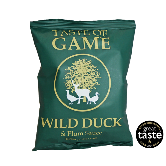 A bag of Taste of Game Wild Duck & Plum Sauce crisps. The packaging is green with an image of a tree and a logo featuring a stylized duck and plum sauce bottle.