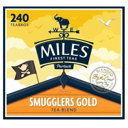 Packaging of Miles Smugglers Gold tea bags, featuring an illustration of a pirate flag and a seagull, with a yellow and blue color scheme.