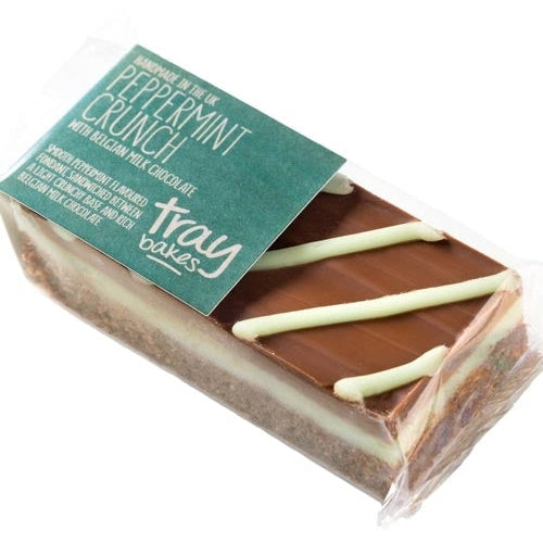 Packaged peppermint crunch chocolate bar with visible white peppermint icing on top of milk chocolate, labeled 'Traybakes'.