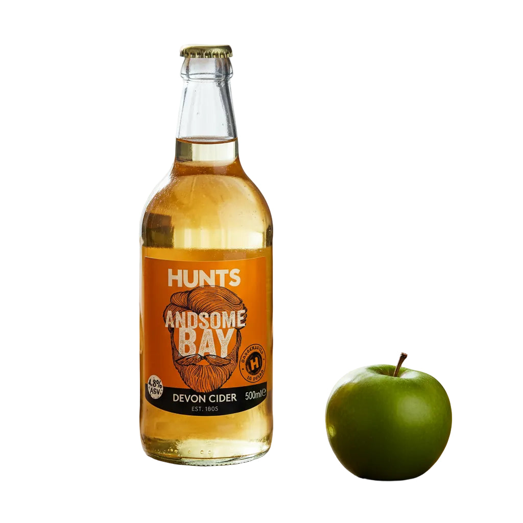 A bottle of Hunts Andsome Bay Devon Cider, 500ml, with a visible label showing the brand and product name.