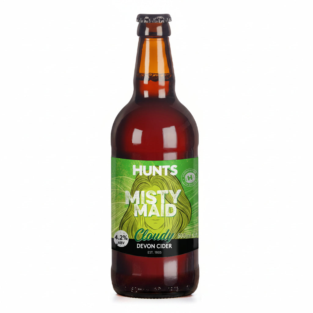 A bottle of Hunts Misty Maid cloudy Devon cider with a label indicating 4.2% ABV, 500ml size, and the product code HN0001.
