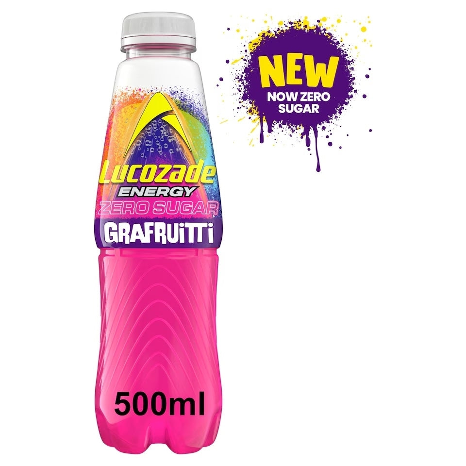 A 500ml bottle of Lucozade Energy Grafruitti zero sugar drink, featuring a bright pink lower bottle and a colorful label with yellow, purple, and orange graphics. A purple 'NEW NOW ZERO SUGAR' badge is shown in the top right corner against a white background.