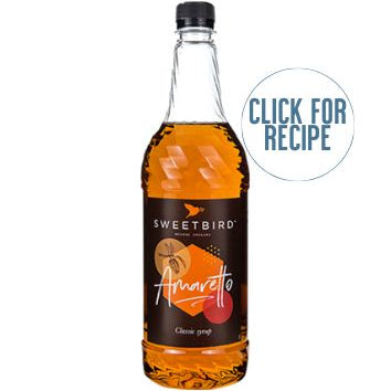 A bottle of SWEETBIRD AMARETTO SYRUP with a label showing the product name and a 'Click for Recipe' button.