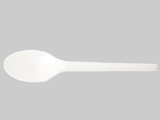 A single white spoon on a plain background.