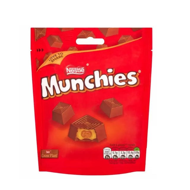 A red bag of Nestlé Munchies snack, featuring images of the chocolate snacks on the front.