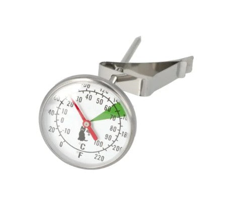 An analog cooking thermometer with a dual dial for measuring temperature in both Fahrenheit and Celsius, featuring a silver body and a red indicator on the dial.