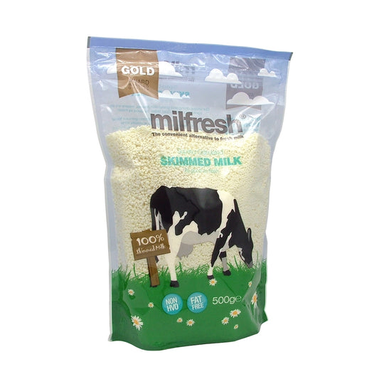 A sealed bag of Milfresh Gold Milk, 500g, with a graphic of a cow in a field.