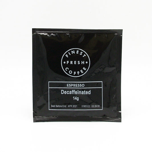 A sachet of Fine Fresh Coffee Decafinated Espresso with the weight of 14g displayed on the packaging.