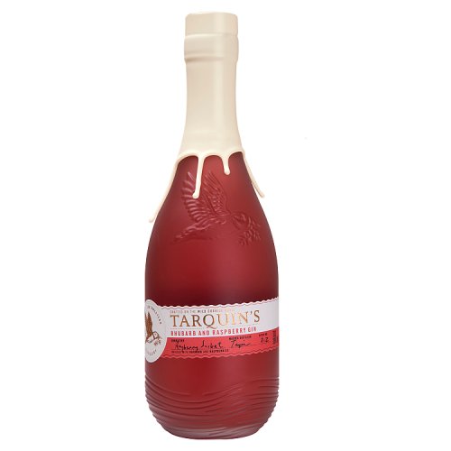 A bottle of TARQUIN'S RHUBARB & RASPBERRY GIN with a clear red liquid visible through the transparent glass. The label displays the product name and the flavor.