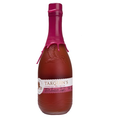 A bottle of TARQUINS STRAWBERRY & LIME GIN with a clear liquid visible through the transparent glass. The bottle is sealed with a pink cap and has a label indicating the brand and flavor.