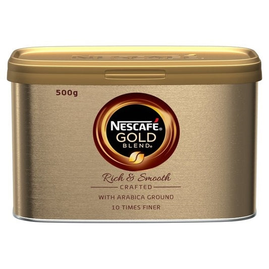 A tin container of NESCAFE GOLD BLEND COFFEE, 500g size, with branding and product information on the label.