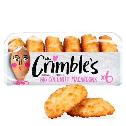 Packaging of Mrs Crimble's gluten free macaroonons with big coconut, showing six macaroonons in a transparent box, with a character illustration and pink accents.