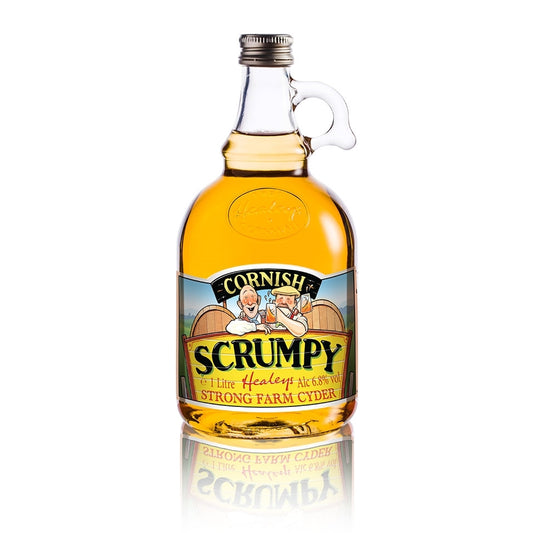 A bottle of Healeys Scrumpy cider with a label featuring cartoon figures and the text 'SCRUMPY' prominently displayed.