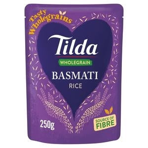 A package of Tilda Wholegrain Basmati Rice, 250g size, with a purple and green heart-shaped design on the front.