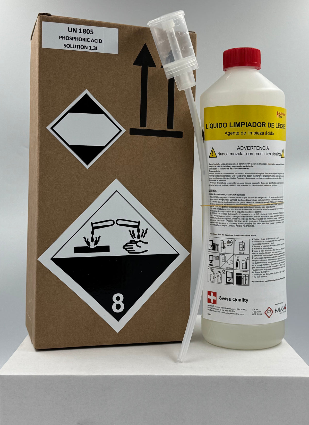 Bottle of liquid with a spray nozzle and a cardboard box with hazard symbols on a white background
