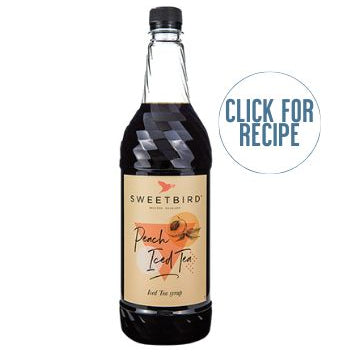 A bottle of Sweetbird Peach Iced Tea Syrup with a label showing the brand name and 'click for recipe' text, indicating a peach iced tea flavor.