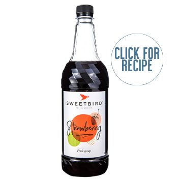 A plastic bottle of Sweetbird Strawberry Syrup with a label showing the brand name and a graphic of strawberries. There is a 'Click for Recipe' text on the bottle.