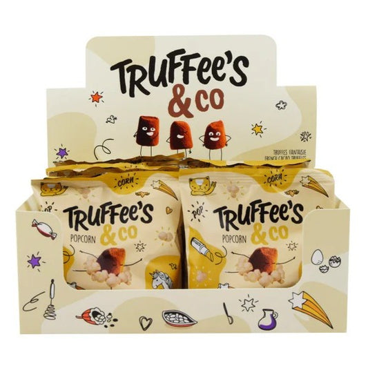 Truffee's & Co packaging with popcorn bags and branded display stand on a white background