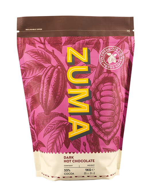 Zuma dark hot chocolate packaging with cacao bean design on a pink background
